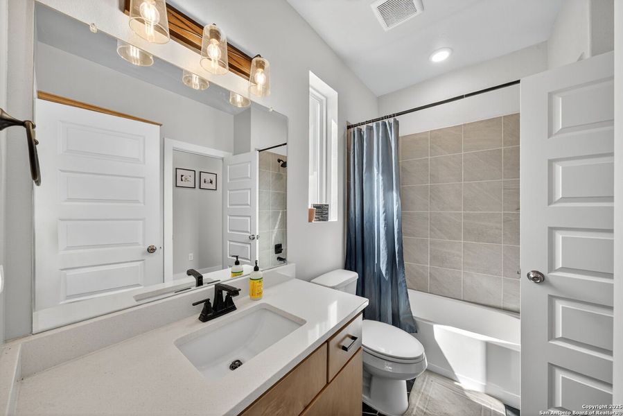 Furnished interior view inside a new home in , Devine (Image 5).