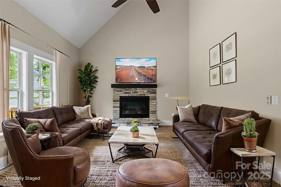 great room with vaulted ceiling & stone fireplace great room with vaulted ceiling & stone fireplace