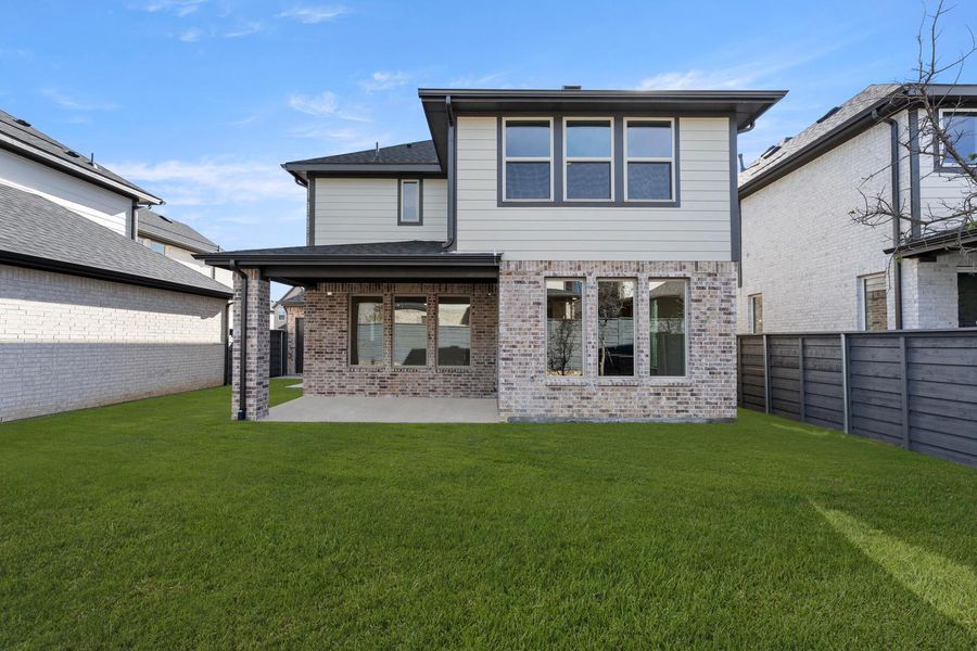 Exterior details and patio area of a home in Union Park, Little Elm (Image 19).