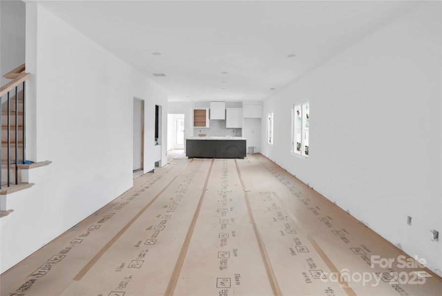 Open concept living, dining, and kitchen area