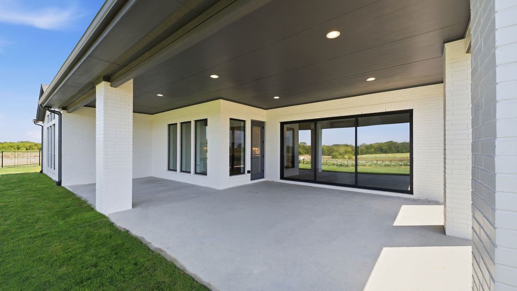 Exterior details and patio area of a home in Bristol Valley, Heath (Image 3).