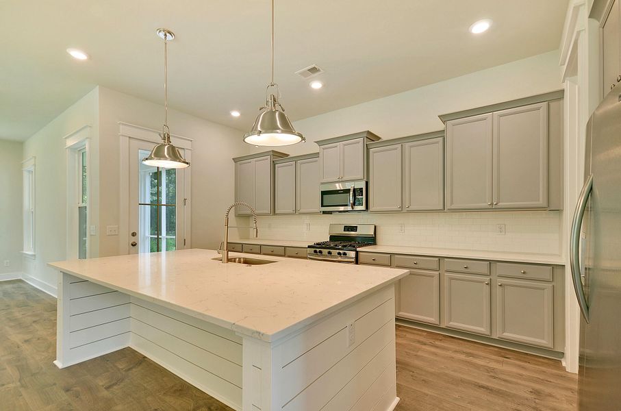 Furnished interior view inside a new home in Heron's Walk at Summers Corner: Row Collection, Summerville (Image 9). Furnished interior view inside a new home in Heron's Walk at Summers Corner: Row Collection, Summerville (Image 9).