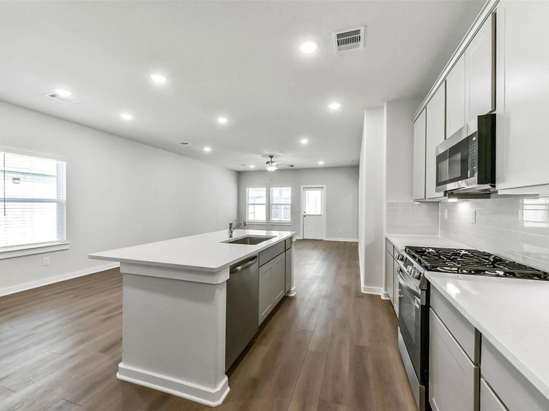 Furnished interior view inside a new home in Windmill Estates, Magnolia (Image 16).