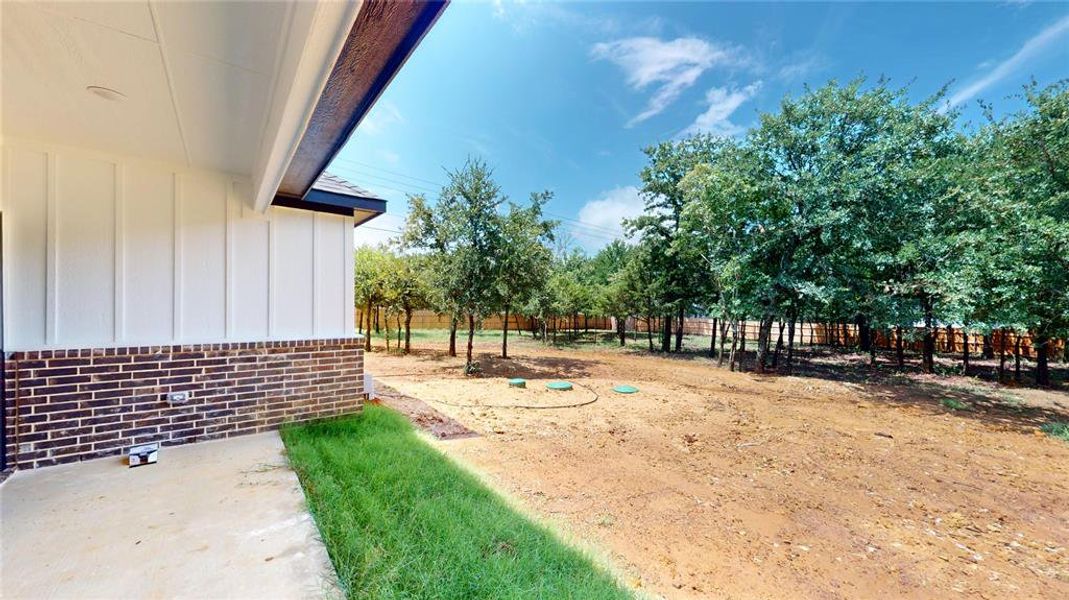 Front exterior of a new home in , Keene, TX, highlighting curb appeal (Image 21). Front exterior of a new home in , Keene, TX, highlighting curb appeal (Image 21).