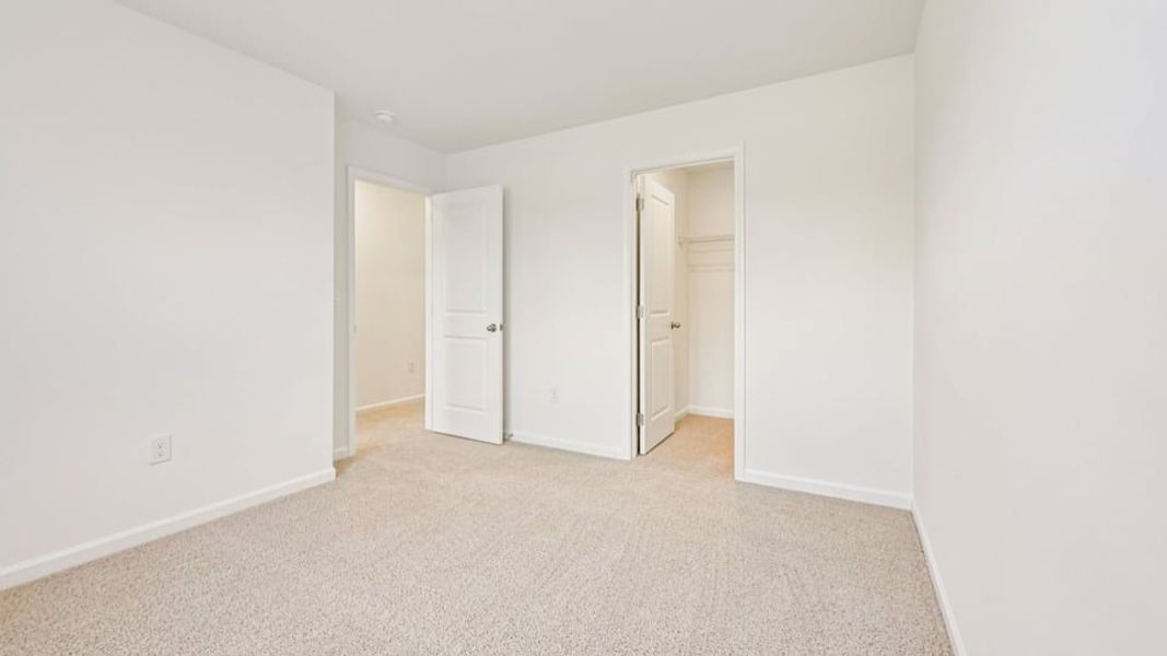 Spacious, unfurnished interior of a new home in Chapel Townes, Raleigh (Image 19).