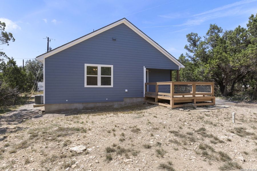 Exterior details and patio area of a home in , Bandera (Image 20).