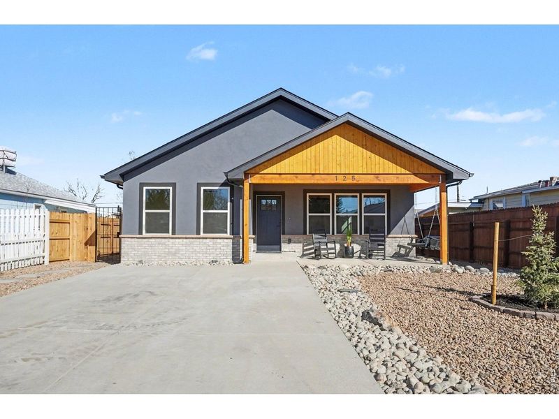 Exterior details and patio area of a home in , Dacono (Image 21).