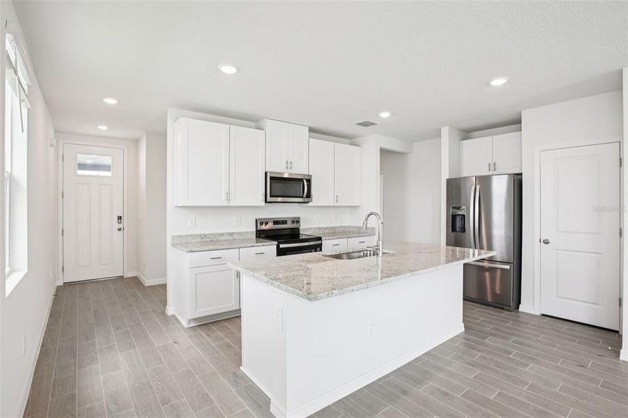 Furnished interior view inside a new home in Two Rivers - Premier Series, Zephyrhills (Image 6).