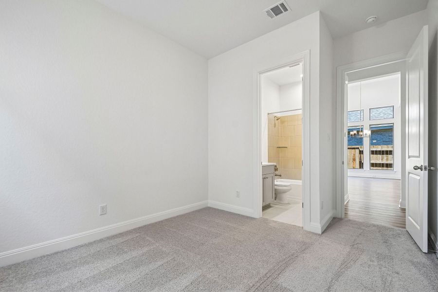 Spacious, unfurnished interior of a new home in 6 Creeks, Kyle (Image 22).