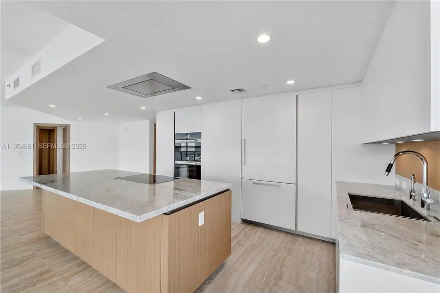 Furnished interior view inside a new home in , Bay Harbor Islands (Image 4). Furnished interior view inside a new home in , Bay Harbor Islands (Image 4).