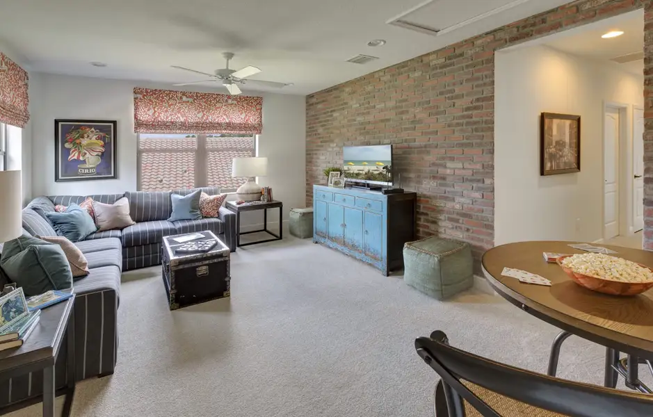 Representative furnished interior of a home built from the Laurel 2 by Neal Communities in Palm Grove, Bradenton (Image 6).