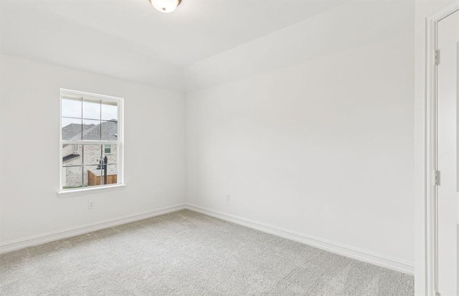Secondary bedroom designed for comfort and convenience  *Real home pictured