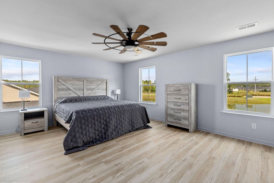 Furnished interior view inside a new home in Sweetgrass at Summers Corner, Summerville (Image 36).