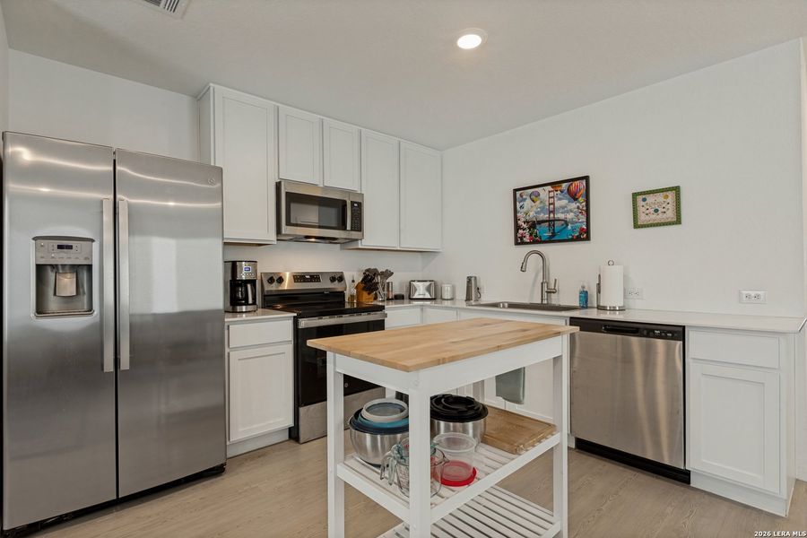 Furnished interior view inside a new home in Valle Sol, Von Ormy (Image 7).