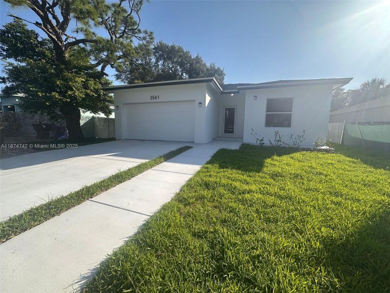 Front exterior of a new home in , Fort Lauderdale, FL, highlighting curb appeal (Image 2). Front exterior of a new home in , Fort Lauderdale, FL, highlighting curb appeal (Image 2).
