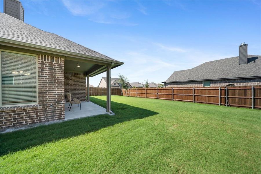 Front exterior of a new home in Aero Vista, Caddo Mills, TX, highlighting curb appeal (Image 26). Front exterior of a new home in Aero Vista, Caddo Mills, TX, highlighting curb appeal (Image 26).