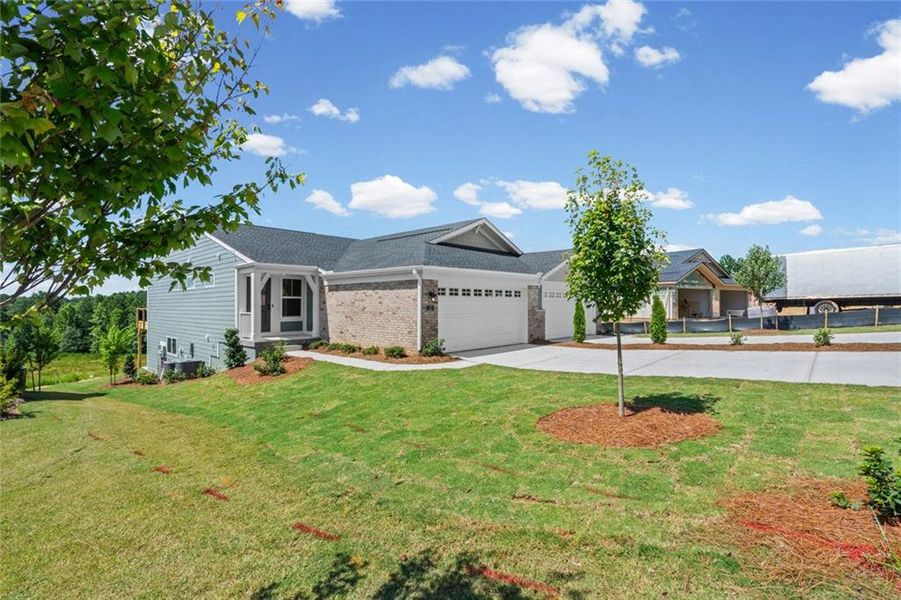 Front exterior of a new home in Villas at Gold Creek, Dawsonville, GA, highlighting curb appeal (Image 19).