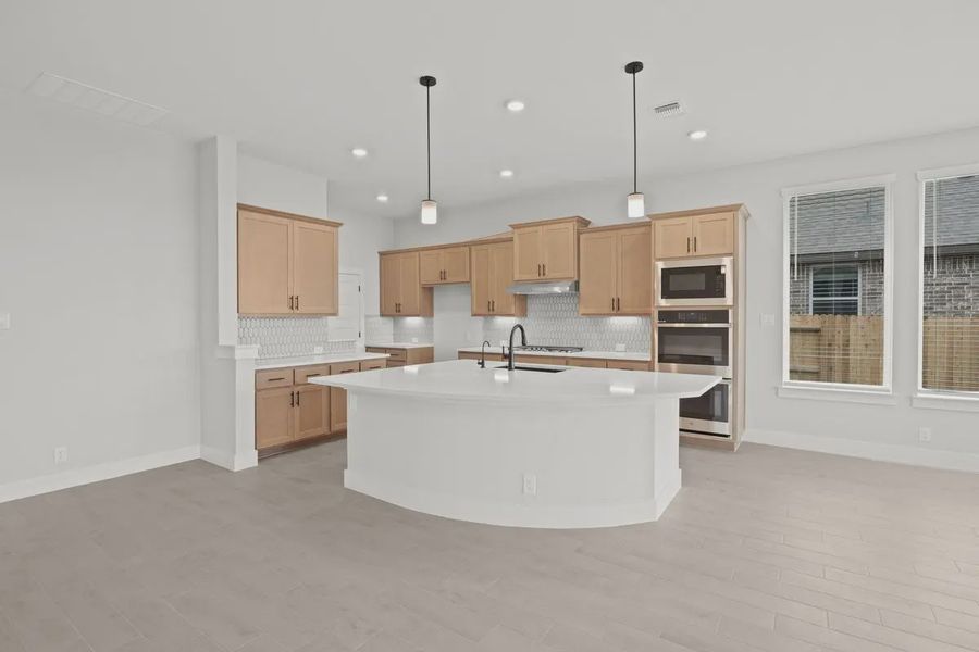 Representative furnished interior of a home built from the Gibson by Chesmar Homes in Highland Village, Georgetown (Image 4).