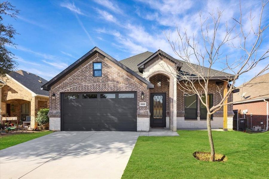 Front exterior of a new home in , Fort Worth, TX, highlighting curb appeal (Image 2). Front exterior of a new home in , Fort Worth, TX, highlighting curb appeal (Image 2).