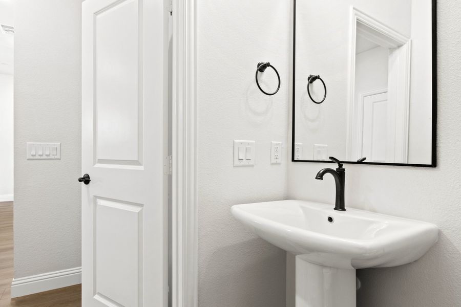 Furnished interior view inside a new home in The Tribute, The Colony (Image 34).