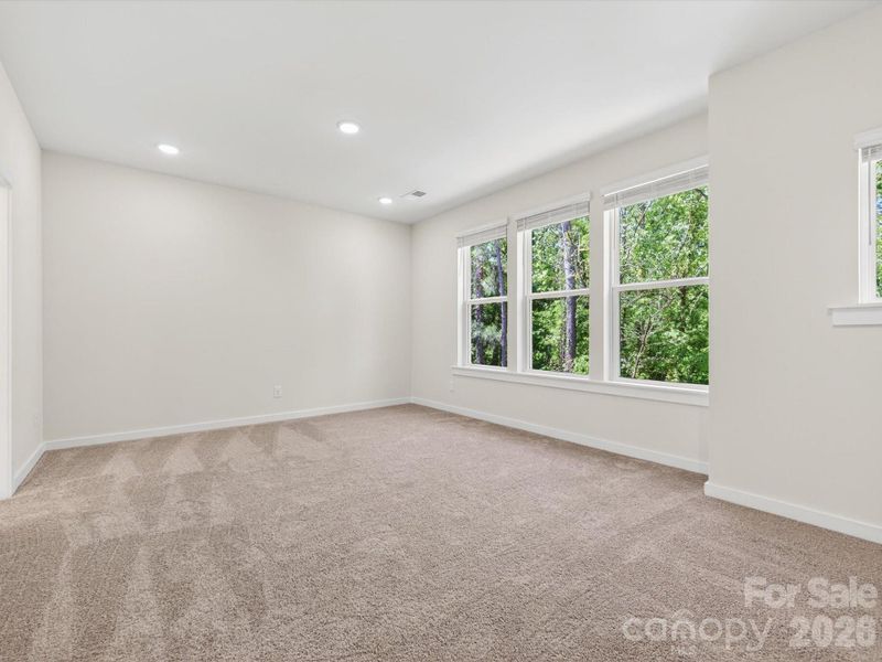 Spacious, unfurnished interior of a new home in Central Living at Craig, Charlotte (Image 11). Spacious, unfurnished interior of a new home in Central Living at Craig, Charlotte (Image 11).
