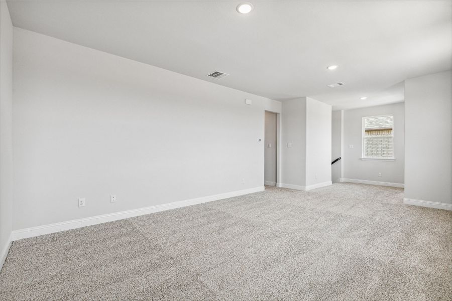 Representative unfurnished interior of a home built from the Lyla by Megatel Homes in Santorini, Seagoville (Image 14).