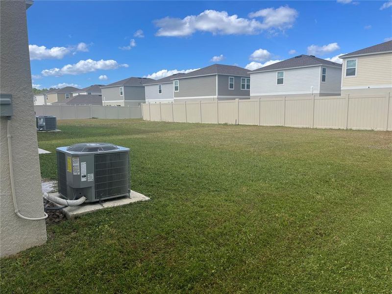 Exterior details and patio area of a home in Pasadena Point, Wesley Chapel (Image 19).
