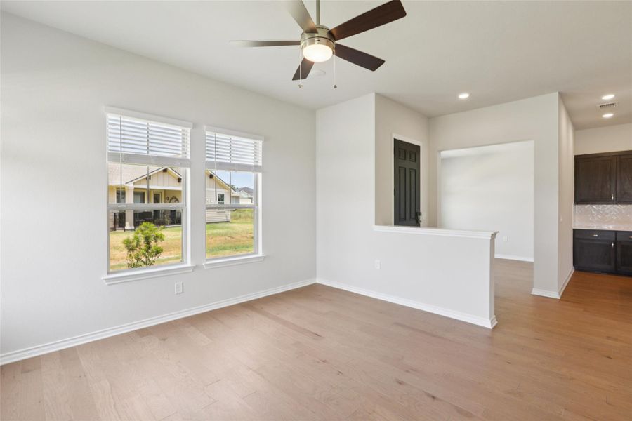 Spare room featuring light wood-style floors, recessed lighting, and ceiling fan Spare room featuring light wood-style floors, recessed lighting, and ceiling fan