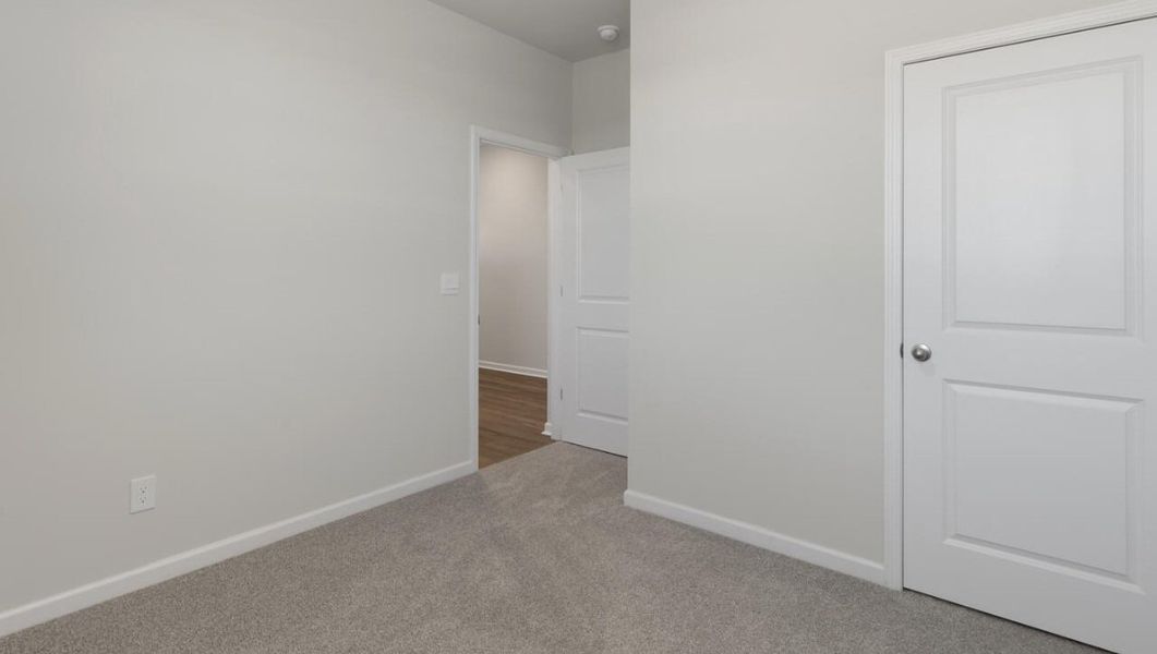 Spacious, unfurnished interior of a new home in Cedar Hill Landing, Navassa (Image 24).