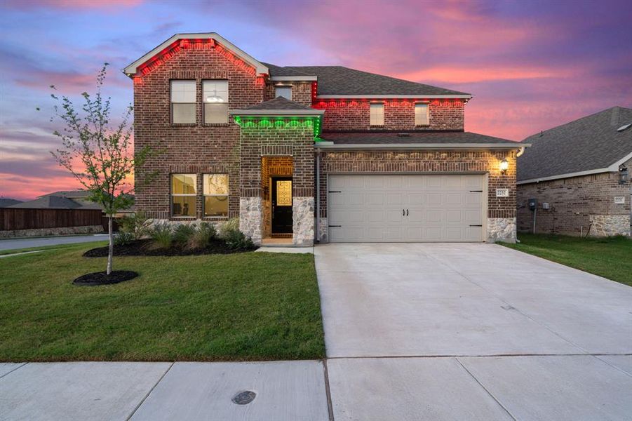 Front exterior of a new home in Northstar, Haslet, TX, highlighting curb appeal (Image 2).