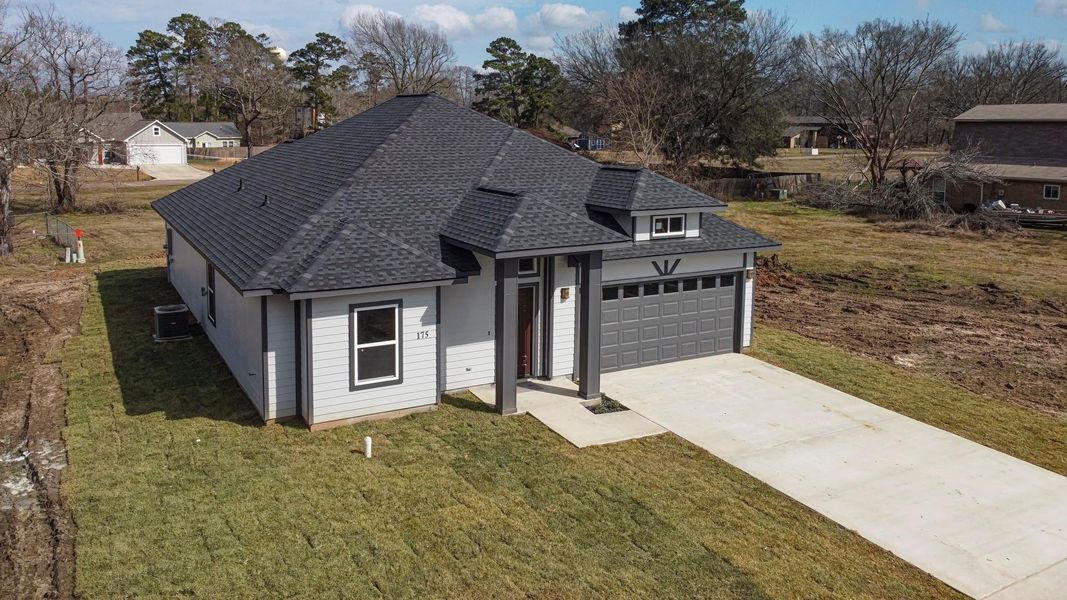 Front exterior of a new home in , Livingston, TX, highlighting curb appeal (Image 29). Front exterior of a new home in , Livingston, TX, highlighting curb appeal (Image 29).
