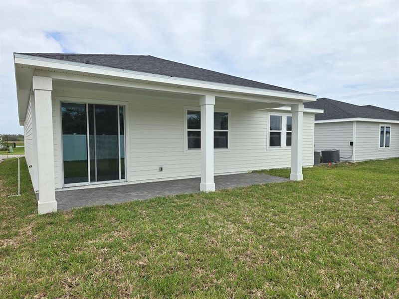 Exterior details and patio area of a home in Colbert Landings, Palm Coast (Image 19).