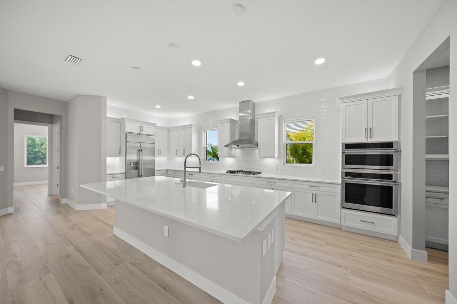 Representative furnished interior of a home built from the Islander I by Homes by Towne in Palmera at Wellen Park, Venice (Image 5).