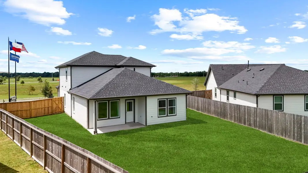 Exterior details and patio area of a home in Lakes at Westland Ranch, League City (Image 2).