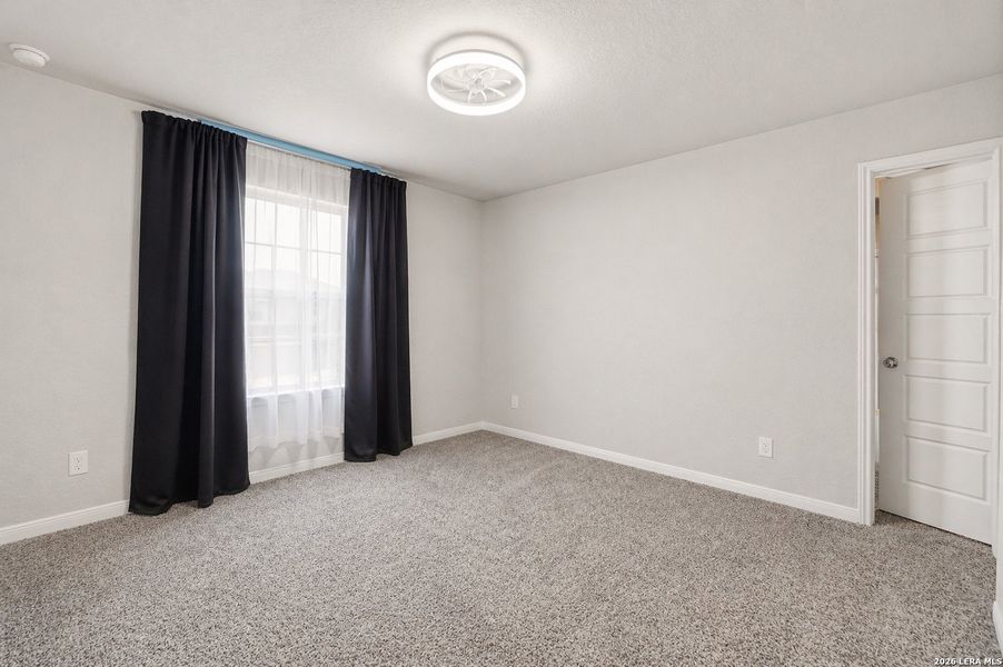 Spacious, unfurnished interior of a new home in Winding Brook, San Antonio (Image 24).