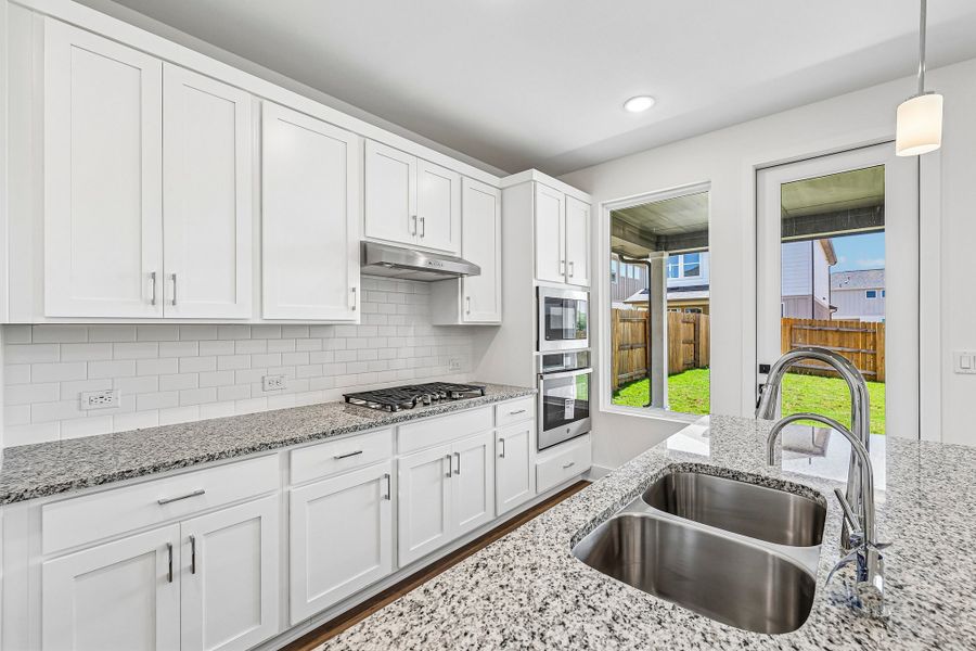 Furnished interior view inside a new home in Freedom at Anthem, Kyle (Image 4).