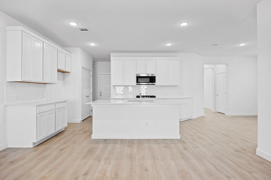 Kitchen in the Oak home plan by Trophy Signature Homes – REPRESENTATIVE PHOTO Kitchen in the Oak home plan by Trophy Signature Homes – REPRESENTATIVE PHOTO