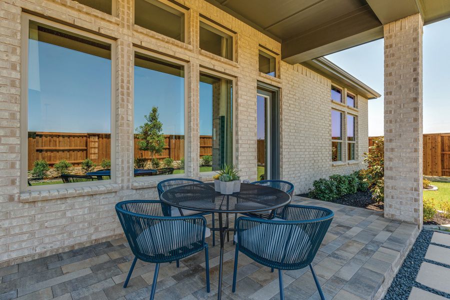 Exterior details and patio area of a home in Mantua Point Classics, Van Alstyne (Image 3). Exterior details and patio area of a home in Mantua Point Classics, Van Alstyne (Image 3).