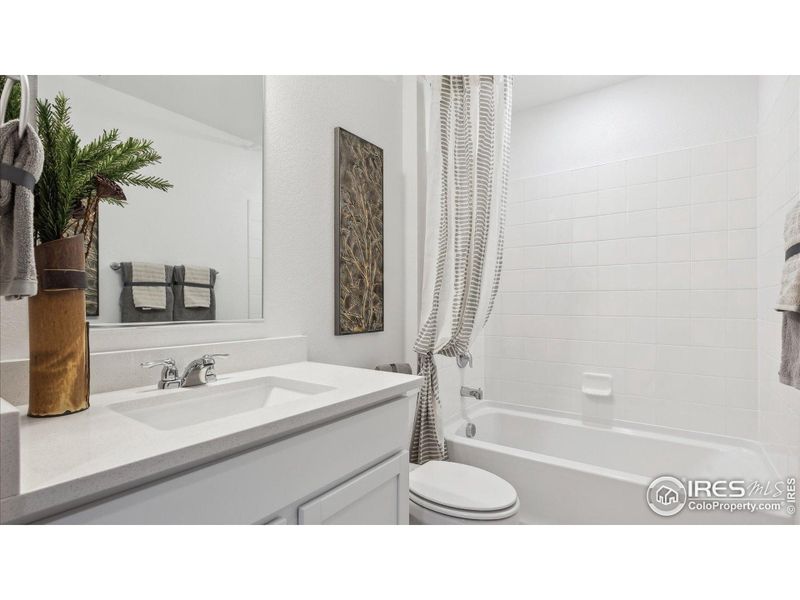 Furnished interior view inside a new home in Villas at Vantage, Berthoud (Image 14).