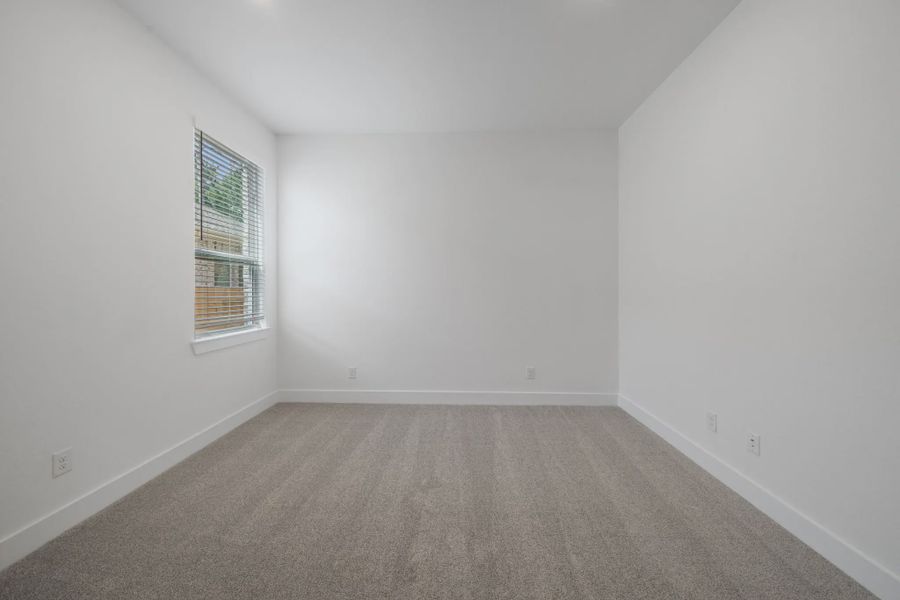 Representative unfurnished interior of a home built from the Waterloo by Chesmar Homes in Attwater 65's, Waller (Image 18).