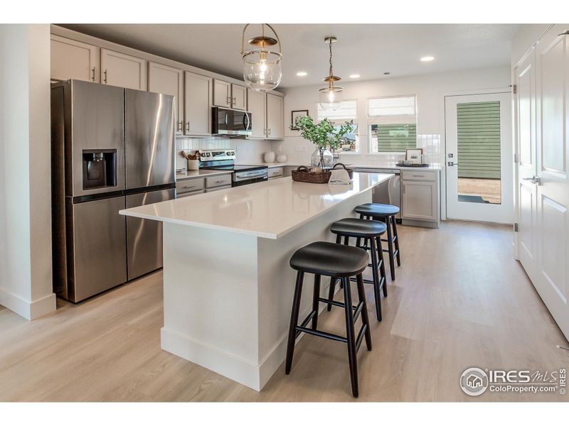 EXAMPLE PHOTO: KITCHEN W/ S.S. APPLIANCES EXAMPLE PHOTO: KITCHEN W/ S.S. APPLIANCES