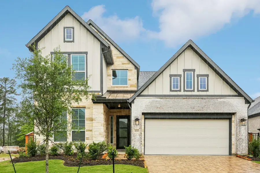 Front exterior of a new home in , Montgomery, TX, highlighting curb appeal (Image 19). Front exterior of a new home in , Montgomery, TX, highlighting curb appeal (Image 19).