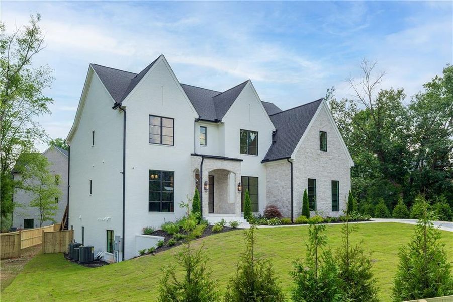 Front exterior of a new home in , Alpharetta, GA, highlighting curb appeal (Image 27). Front exterior of a new home in , Alpharetta, GA, highlighting curb appeal (Image 27).