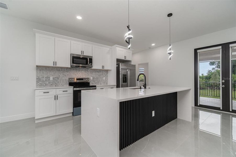 Furnished interior view inside a new home in , Port Charlotte (Image 9). Furnished interior view inside a new home in , Port Charlotte (Image 9).