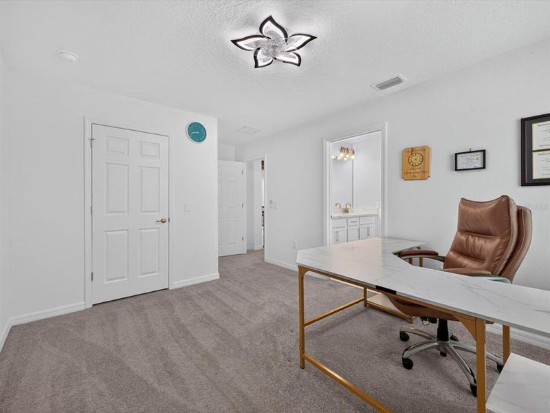 Furnished interior view inside a new home in Storey Creek, Kissimmee (Image 40).