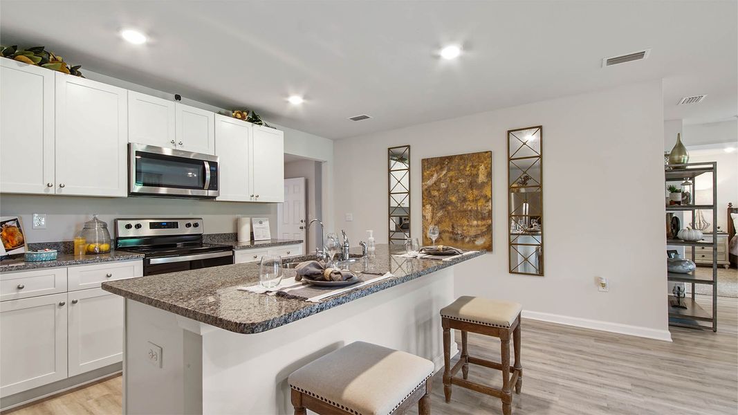 Representative furnished interior of a home built from the Cali by D.R. Horton in Ashton Park Phase III, Freeport (Image 10).