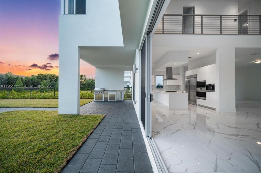 Exterior details and patio area of a home in , Weston (Image 29).