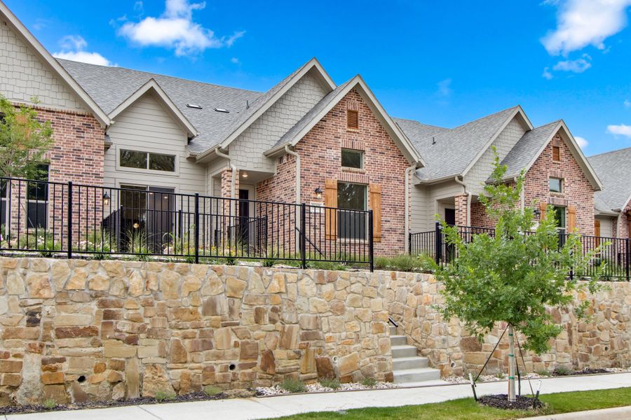 Front exterior of a new home in Cottonwood Creek, Rowlett, TX, highlighting curb appeal (Image 2). Front exterior of a new home in Cottonwood Creek, Rowlett, TX, highlighting curb appeal (Image 2).