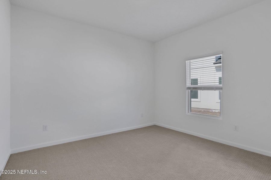 Spacious, unfurnished interior of a new home in Cordova Palms, St. Augustine (Image 16).