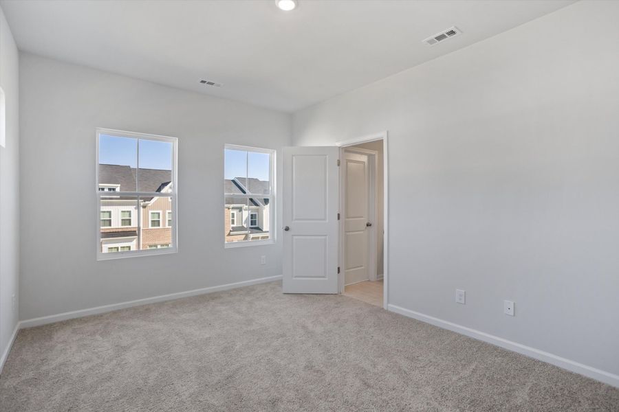 Spacious, unfurnished interior of a new home in Renaissance at White Oak, Garner (Image 19).